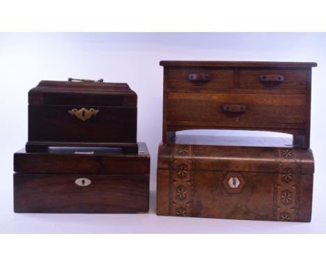 A George III mahogany tea caddy, gutted, 22 cm wide, an oak table top chest of three drawers, a Tunbridge ware writing slope 