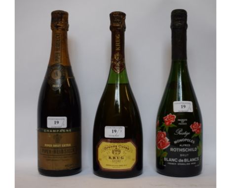 A bottle of Krug champagne, NV, a bottle of Piper Heidsieck champagne, 1959, and a bottle of Prestige Monopoles sparkling win