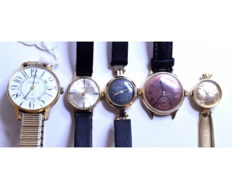 A lady's 18ct gold Movado wristwatch, on a 18ct gold bracelet, with some damages, a lady's 14ct gold watch, two other watches