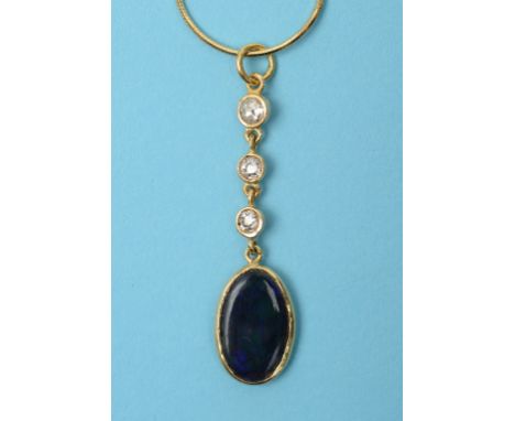 A black opal and diamond pendant, in a yellow coloured metal set in, on an 18ct gold chain  See front cover colour illustrati