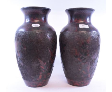 A pair of Japanese cloisonne enamel vases, decorated birds on blossoming branches, on a tree bark ground, 33.5 cm high (2)   