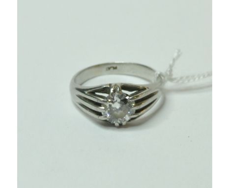 A platinum and gypsy set diamond ring, approx. ring size K½