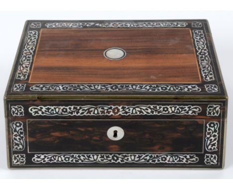 A mahogany, coromandel wood and mother of pearl inlaid sewing box, with a fitted interior containing mother of pearl bobbins 