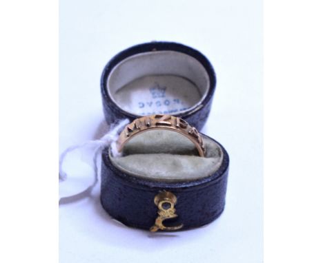 A 9ct gold memoriam ring, approx. 2.2 g, another memoriam ring with hair locket, and two other rings, all boxed (4)   Conditi