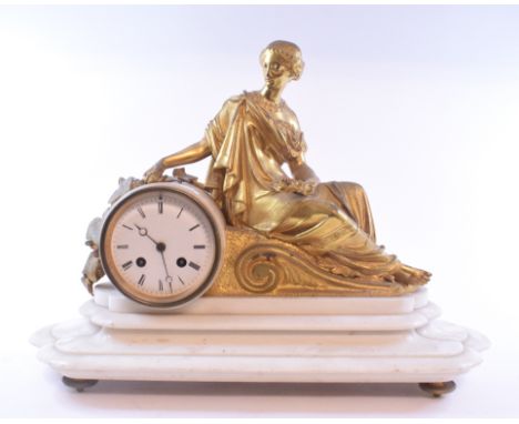 A French mantel clock, the white dial with Roman numerals, in a marble case applied a gilt metal figure, 31.5 cm high   Condi