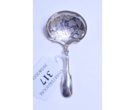 An early 19th century silver fiddle pattern caddy spoon, initialled, the bowl engraved foliage, Joseph Willmore, Birmingham 1