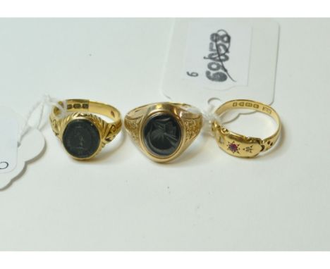 An 18ct gold, ruby and diamond gypsy ring, approx. ring size N, a gentleman's 18ct gold and hardstone seal ring, and a simila