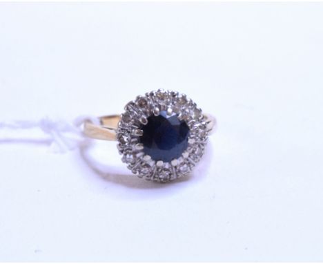 An 18ct gold, sapphire and diamond ring, approx. ring size K½    Condition report  Approx. 4.4 g (all in)  Sapphire approx. 6