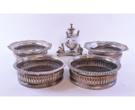 Two pairs of 19th century plated wine coasters, and a plated table cigar lighter, applied figures (5)