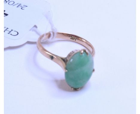 A 14ct gold and jade ring, and a silver Albert, with a fob (2)