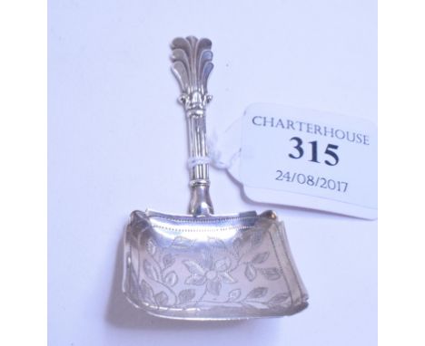 An early Victorian silver caddy spoon, with an anthemion style finial, the bowl engraved a flower and foliage, George Unite, 