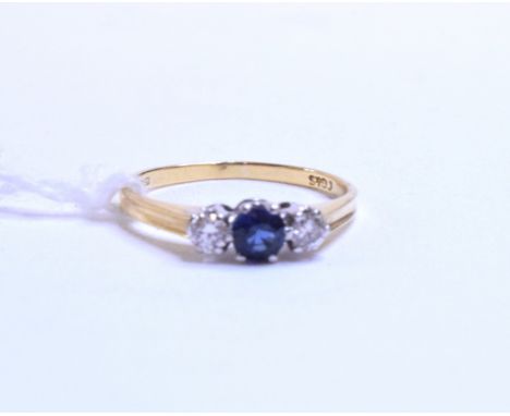 An 18ct gold sapphire and diamond ring, approx. ring size K ½   Condition report  Approx. 2.0 g (all in)