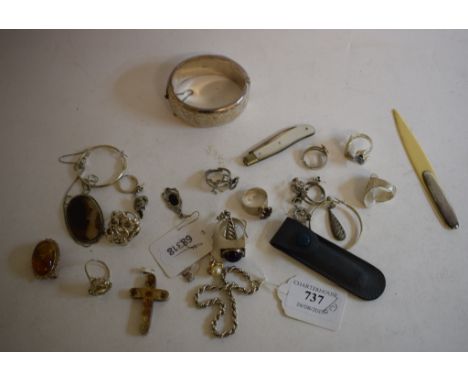 A silver bangle, a silver and mother of pearl penknife, other jewellery and items 