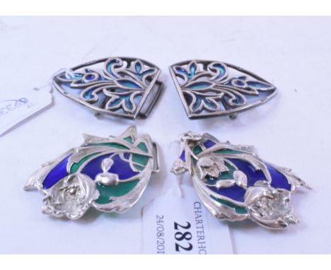 A silver nurses type buckle, and another similar, both with enamel style decoration (2)    Condition report  Enamel decoratio