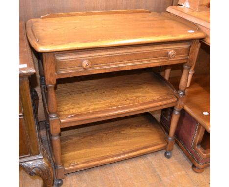 An Ercol elm serving trolley, 78 cm wide, a pine chest of drawers, other pine furniture and items (qty)