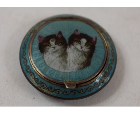 A Continental enamel and silver gilt coloured metal pill box and hinged cover, decorated a pair of cats, assorted mother of p