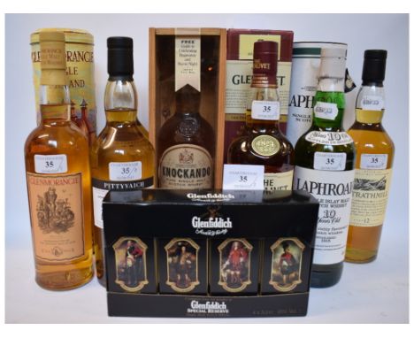 A bottle of Glenmorangie single highland malt Scotch whisky, aged ten years, 40% vol, with tube, a bottle of Glenlivet single