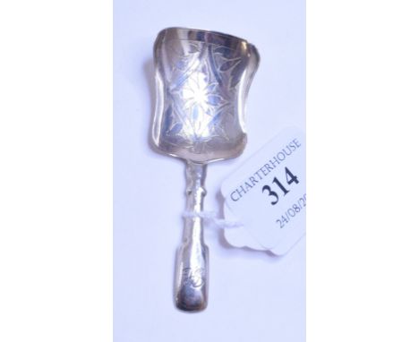 An early 19th century silver fiddle pattern caddy spoon, initialled, the bowl with engraved decoration, Unite & Hilliard, Bir