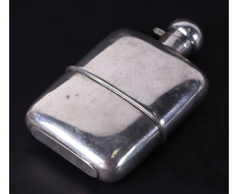 A silver plated hip flask, 9cms wide.Condition ReportThere is a deep indentation to one upper corner and some light pitting a