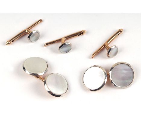 A pair of 1920's 14ct gold and mother of pearl cufflinks; together with three matching buttons, 7.8g.