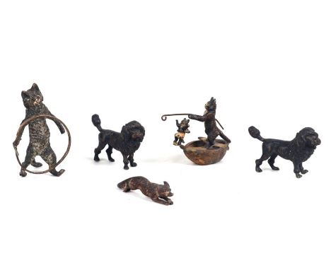 A group of Austrian cold painted bronze miniature animal groups to include a cat and kitten fishing in a walnut shell boat, m