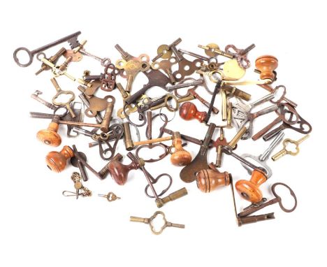 A large quantity of clock key including longcase clock keys.