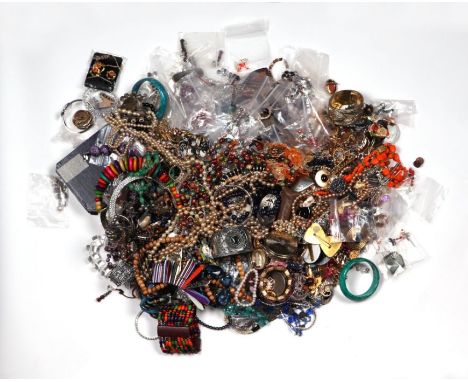 A large quantity of costume jewellery to include earrings and necklaces.