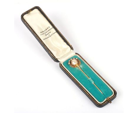 A 19th century 14ct gold pearl set stick pin, boxed.pearl stick pin