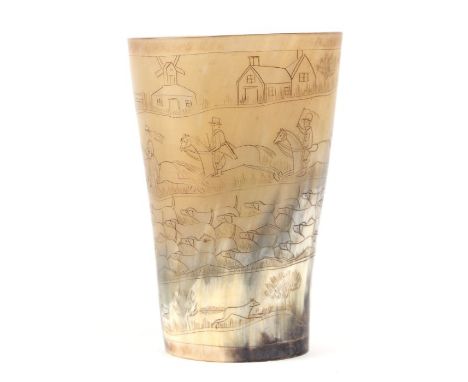A horn beaker decorated with a fox hunting scene, 14cms high.Condition ReportNo chips or cracks but some blobs of glue visibl