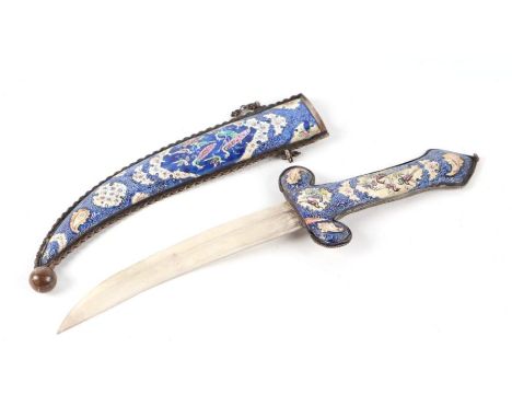 A Persian white metal and enamel dagger decorated with birds on a blue ground, 28cms long.