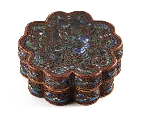A Chinese gilt metal and enamel box decorated foliate scrolls. 9cm diameter