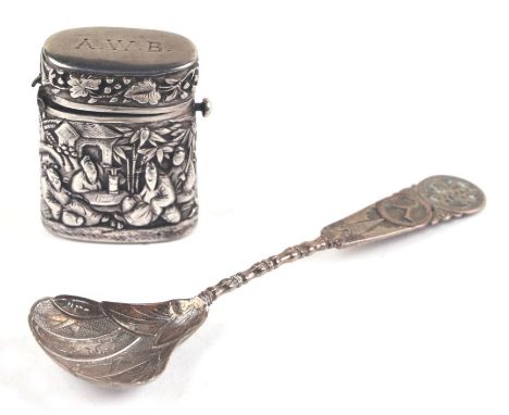 An antique Chinese silver vesta case decorated with figures (hinge a/f); together with a Chinese silver spoon (2).