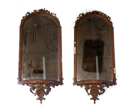 A pair of Victorian giltwood and gesso Pier mirrors with ribbon decoration, both supported by original blue painted shelf wit