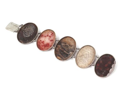 A white metal mounted panel bracelet set with hardstone cabochons.Condition ReportVery minor surface scratching you would exp