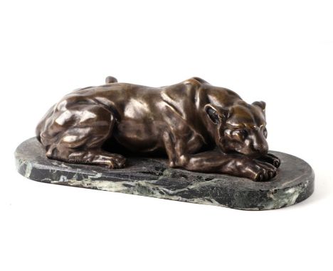 Henri Payen (1894-1933) - a bronze study of a recumbent lioness on a green figured marble plinth, overall 42cms wide.