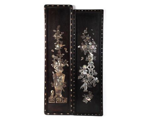 Two Chinese hardwood panels with inlaid mother of pearl decoration, each panel approx 60cms high (2).