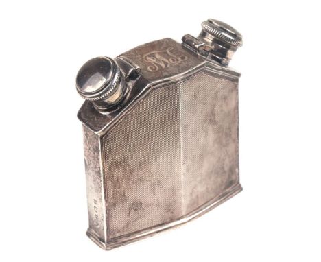 An Art Deco silver double compartment flask in the form of a radiator, Birmingham 1929, 9cms high.Condition ReportThe top is 