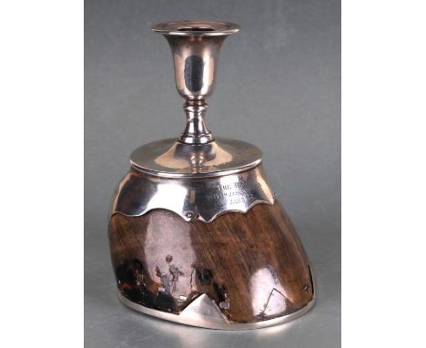 A Roland Ward silver mounted horse hoof desk top candlestick inscribed to 'H.L.W From J.A.O.E. The Tenner, 17th January 1888,