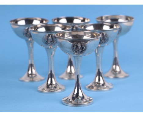 A set of six Thailand sterling silver champagne cups with ornate traditional roundels to the sides, 10cms high, total weight 