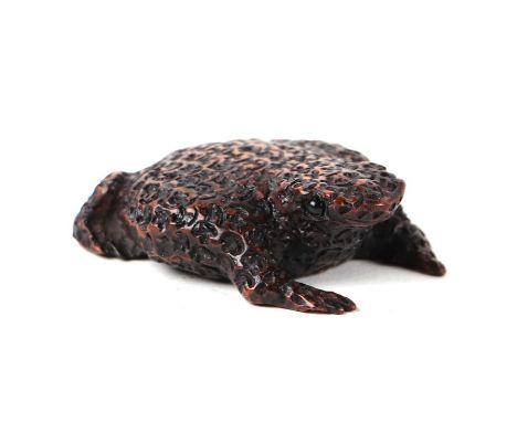 A Japanese style treen folk art snuff box in the form of a toad, 7cms long.Condition ReportLooks to be an old loss to the fro