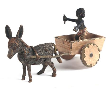An antique novelty Vienna cold painted bronze group in the form of a black boy in a donkey cart, 8cms long.