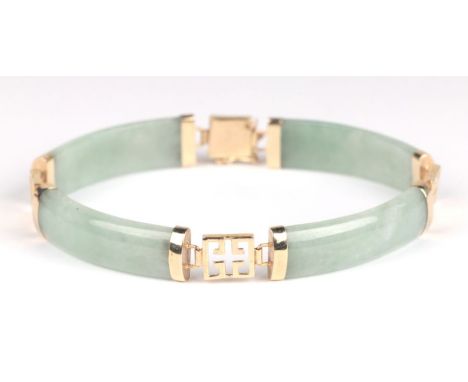 A Chinese 14ct gold mounted jade bracelet.