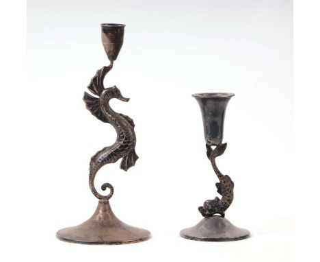 A continental silver candlestick with dolphin column, 13cm high together with another with a seahorse column, 19cm high (2)