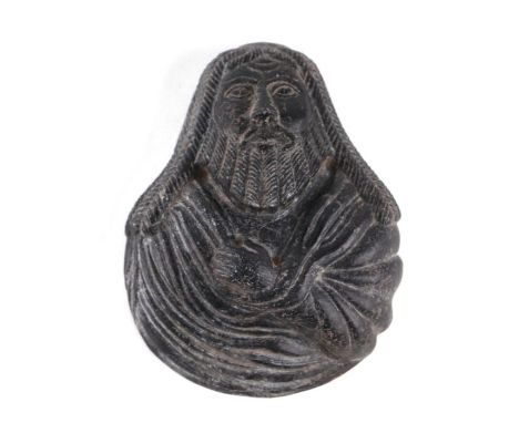 A Persian / Eastern carved figural stone cup in the form of a robed apostle, 14.5cms long.