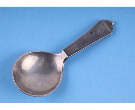 A Georg Jensen Sterling silver caddy spoon. 10cm long.