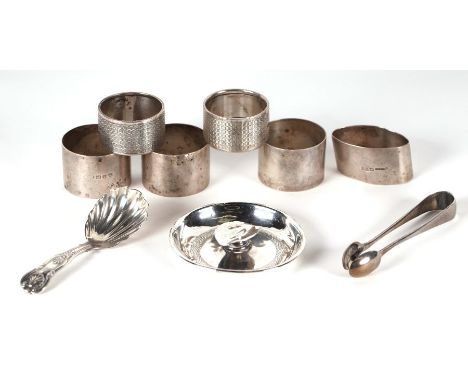 A collection of small items of silver to include a pair of napkin rings with engine turned decoration, Chester 1936; another 