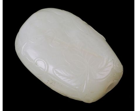 A celadon jade pebble form snuff bottle carved in the form of a melon with leaf and tendrils, 6cms high.