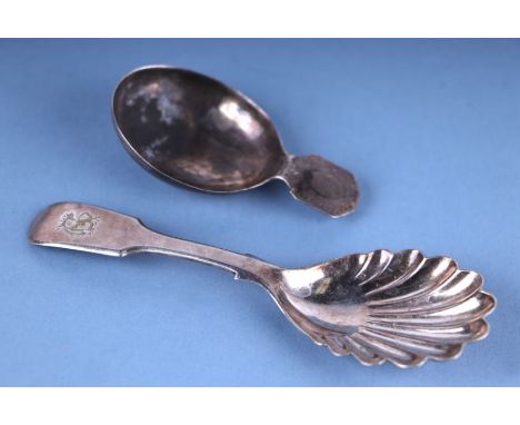 A George III silver caddy spoon, London 1793, 7.4g; together with a similar fiddle pattern and shell bowl caddy spoon, creste