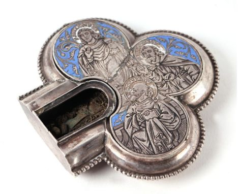 A 19th century white metal and enamel trefoil reliquary engraved with Saints, containing a relic within an arched cavity, 9cm