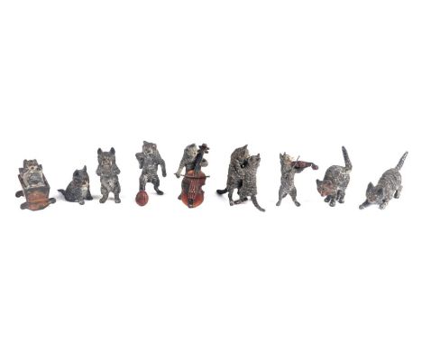 A collection of novelty Vienna cold painted bronze cat figures to include two musicians and a footballer, the largest 3.5cms 